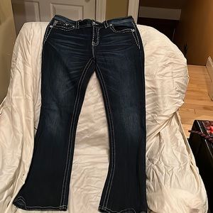 Miss Me boot cut jeans. Never worn. Size 31